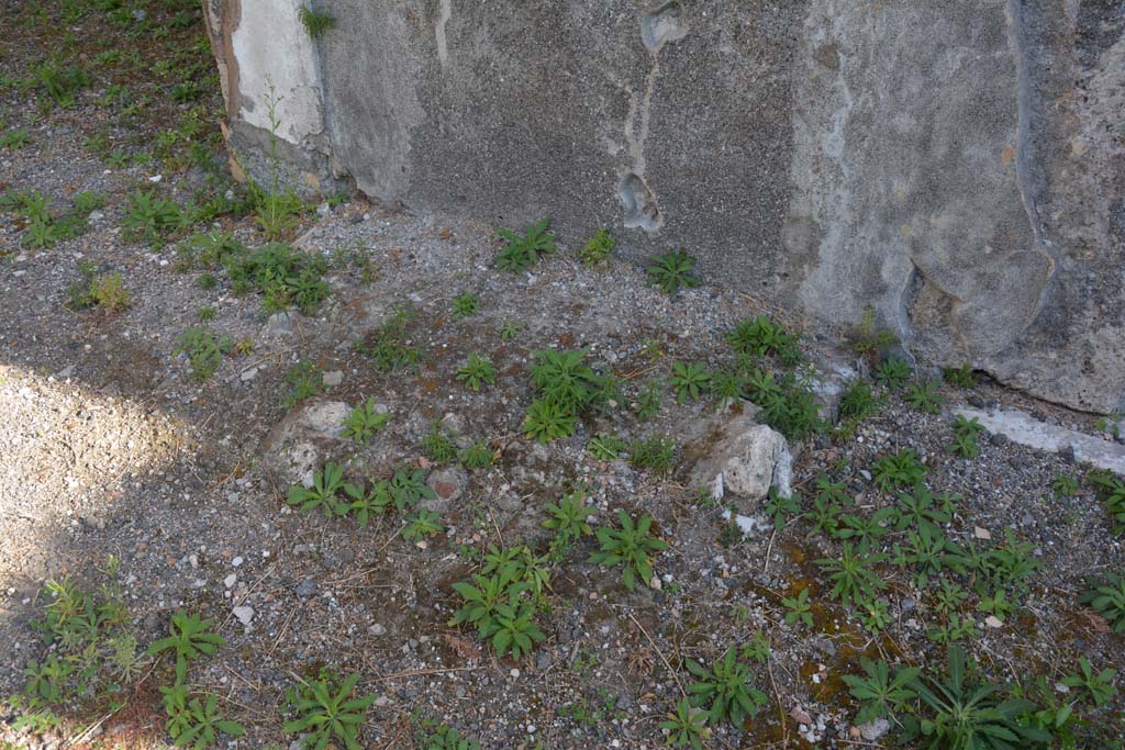 VI.11.10 Pompeii. October 2017. East side of atrium between doorways to rooms 32 and 30, remains of arca or strongbox.
Foto Annette Haug, ERC Grant 681269 DÉCOR
According to PPM –
“Base of the strongbox (arca), empty when found on October 25 1834, but in a relatively good state of conservation: “Wooden box lined with iron and garnished with meanders of various designs made with heads of bronze nails". (Bonnucci 1835, p.127).
Left in situ, the arca has progressively disappeared down to the base.” 
See Carratelli, G. P., 1990-2003. Pompei: Pitture e Mosaici. V. (5). Roma: Istituto della enciclopedia italiana, no.33, p. 18 and 19.