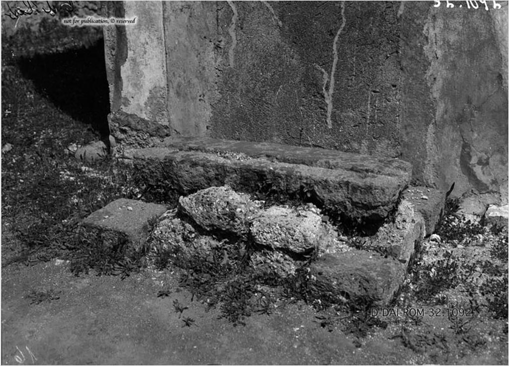 VI.11.10 Pompeii. Chest base against east wall of atrium. 
According to Pernice –
A lava block is attached to three corners of the base, and a travertine block to the fourth. 
The space between these blocks is filled with tuff and crumb rocks. 
There is no evidence of a fastening spike.
See Pernice, E., 1932. Hellenistische Tische, Zisternenmündungen, Beckenuntersätze, Altäre u. Truhen. Berlin, p. 75, Taf. 45.4.
DAIR 32.1092. Photo © Deutsches Archäologisches Institut, Abteilung Rom, Arkiv. 
Thanks to Espen B. Andersson for assisting us in our interest in money-chests.