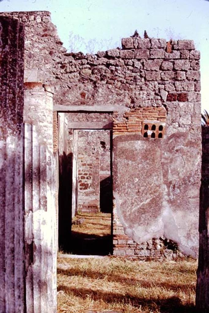 VI.11.10 Pompeii. 1974. 
Looking south from peristyle, towards corridor (room 34), with plaque of terracotta closing the window. 
Photo by Stanley A. Jashemski.
Source: The Wilhelmina and Stanley A. Jashemski archive in the University of Maryland Library, Special Collections (See collection page) and made available under the Creative Commons Attribution-Non Commercial License v.4. See Licence and use details.
J74f0144