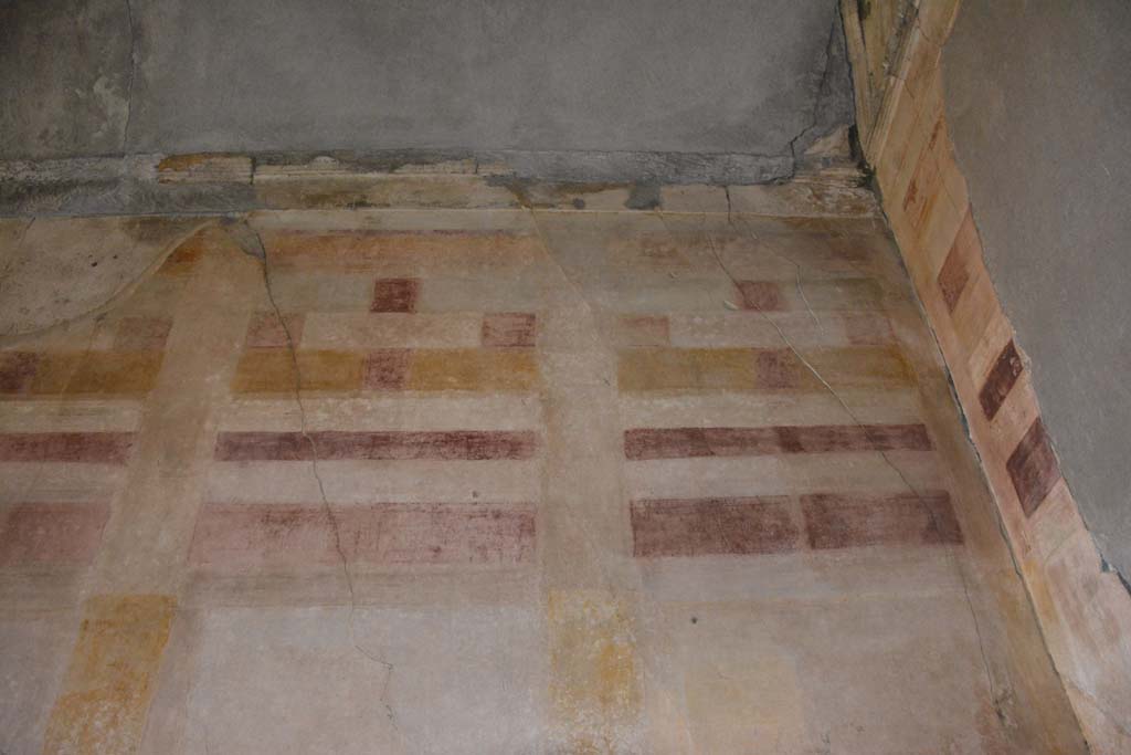 VI.11.10 Pompeii. October 2017. Room 39, detail of upper west wall in north-west corner.
Foto Annette Haug, ERC Grant 681269 DÉCOR