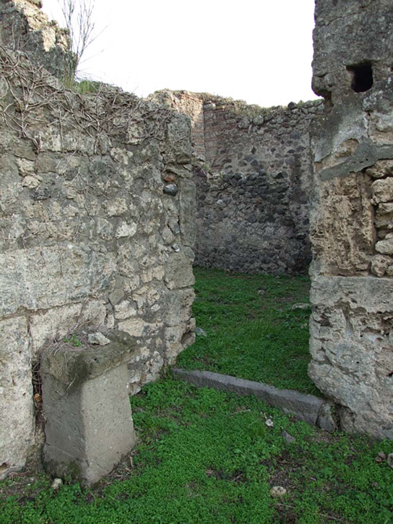 VI.11.19 Pompeii. December 2007. 
Doorway to east room on the south side, (room 11) kitchen leading to yard, and entrance/exit at VI.11.18.