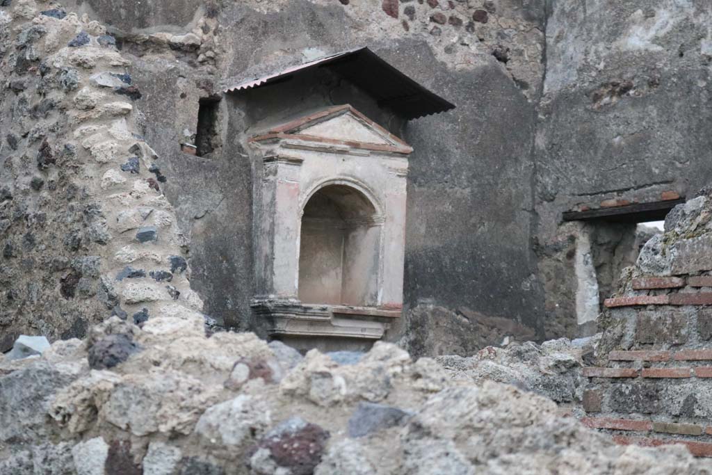 VI.12.2 Pompeii. December 2018. 
Looking towards north wall of kitchen with arched niche lararium, and east wall with window. Photo courtesy of Aude Durand.