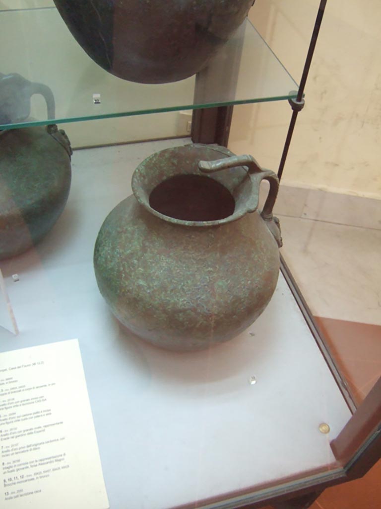VI.12.2 Pompeii. Found on 5th November 1830. One handled bronze jug. 
Now in Naples Archaeological Museum. Inventory number 69429.
See Fiorelli G., 1862. Pompeianarum antiquitatum historia, Vol. 2: 1819 - 1860, Naples, p. 242-243.