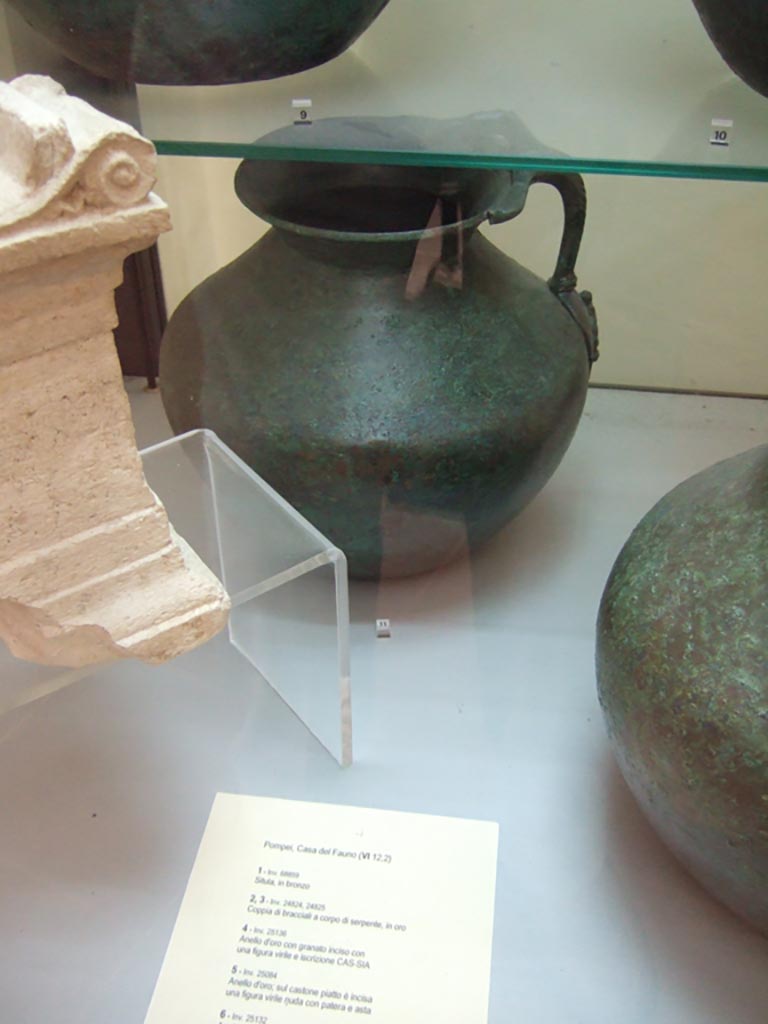 VI.12.2 Pompeii. Found on 5th November 1830. One handled bronze jug. 
Now in Naples Archaeological Museum. Inventory number 69428.
See Fiorelli G., 1862. Pompeianarum antiquitatum historia, Vol. 2: 1819 - 1860, Naples, p. 242-243.