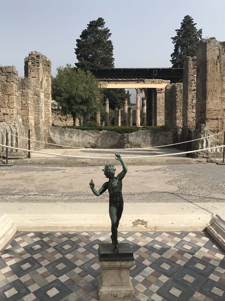 VI.12.2, Pompeii. April 2019. Looking north across detail of impluvium towards tablinum.
Photo courtesy of Rick Bauer.