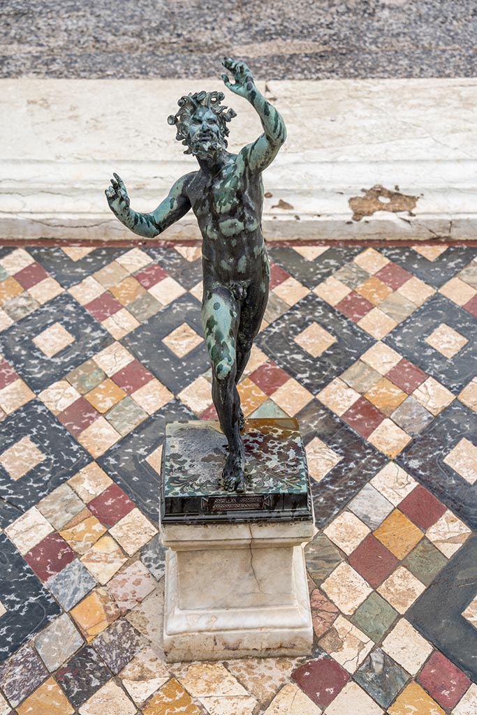 VI.12.2 Pompeii. July 2024. 
Looking north across impluvium with dancing faun. Photo courtesy of Johannes Eber.