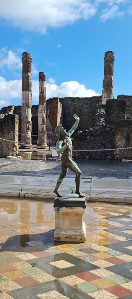 VI.12.2 Pompeii. April 2022. 
Looking east across impluvium in atrium towards atrium of VI.12.5.
Photo courtesy of Giuseppe Ciaramella.