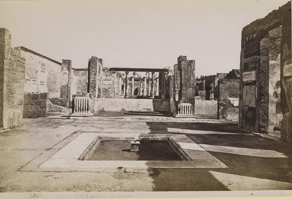 VI.12.2 Pompeii. Photo of 1880s by G. Sommer, number 5316. Looking north across impluvium in atrium, towards tablinum.
The west and east ala can be seen, on either side of the north end of the atrium. Photo courtesy of Rick Bauer.