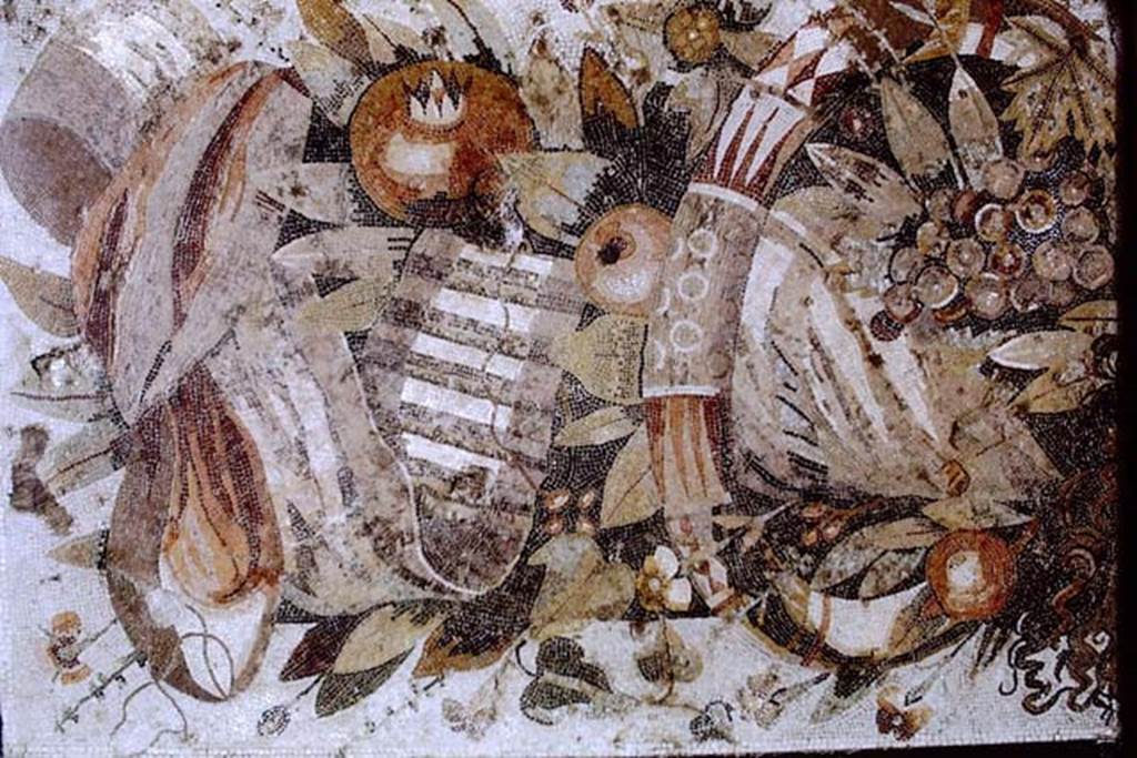 VI.12.2 Pompeii. 1968. Detail from mosaic of fruits, flowers and garlands and two tragic masks.  Photo by Stanley A. Jashemski.
Source: The Wilhelmina and Stanley A. Jashemski archive in the University of Maryland Library, Special Collections (See collection page) and made available under the Creative Commons Attribution-Non Commercial License v.4. See Licence and use details.
J68f1036