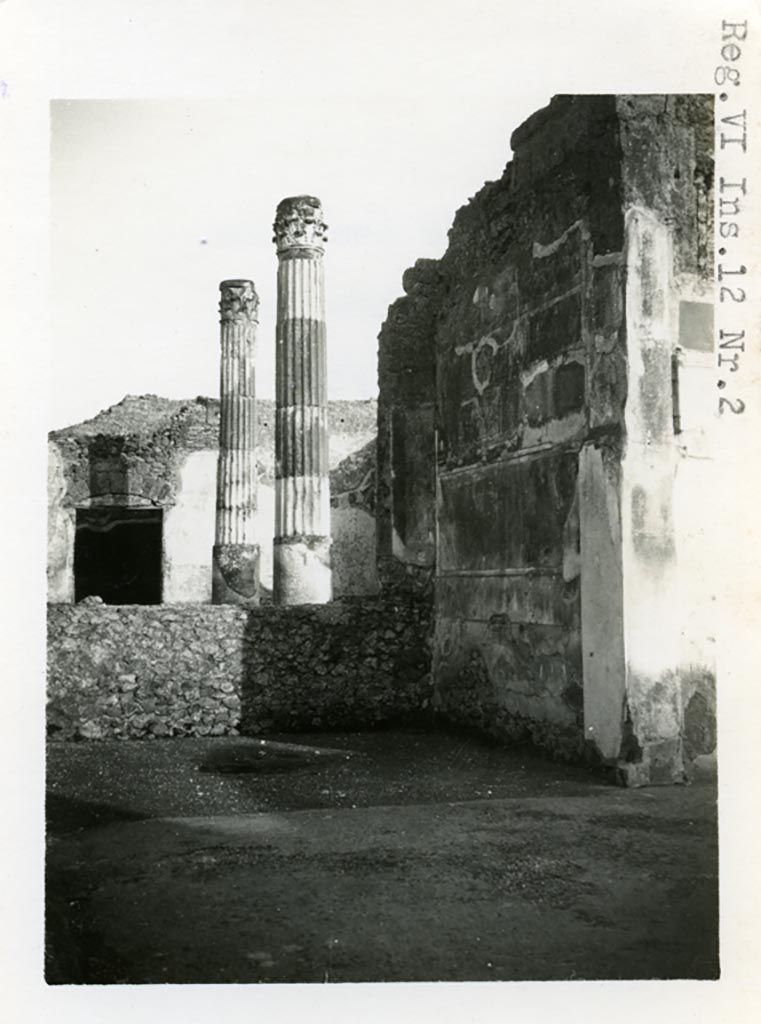 VI.12.2 Pompeii. Pre-1937-39. 
Ala 30, on east side of atrium, looking towards south-east corner, with atrium of VI.12.5 at rear.
Photo courtesy of American Academy in Rome, Photographic Archive. Warsher collection no. 031.