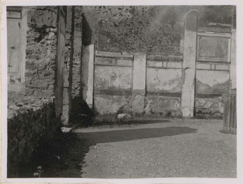 VI.12.2 Pompeii. Pre-1942. 
Looking west along the south portico towards the south-west corner of the middle peristyle/garden.
On the left would the tablinum rear wall, and doorway and window of triclinium on the left (west side) of the tablinum.
See Warscher, T. (1946). Casa del Fauno, Swedish Institute, Rome. (p.34, n.46).