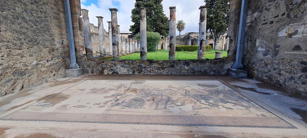 VI.12.2 Pompeii. April 2022. 
Looking north across recreated Alexander mosaic in exedra towards rear peristyle. Photo courtesy of Giuseppe Ciaramella.