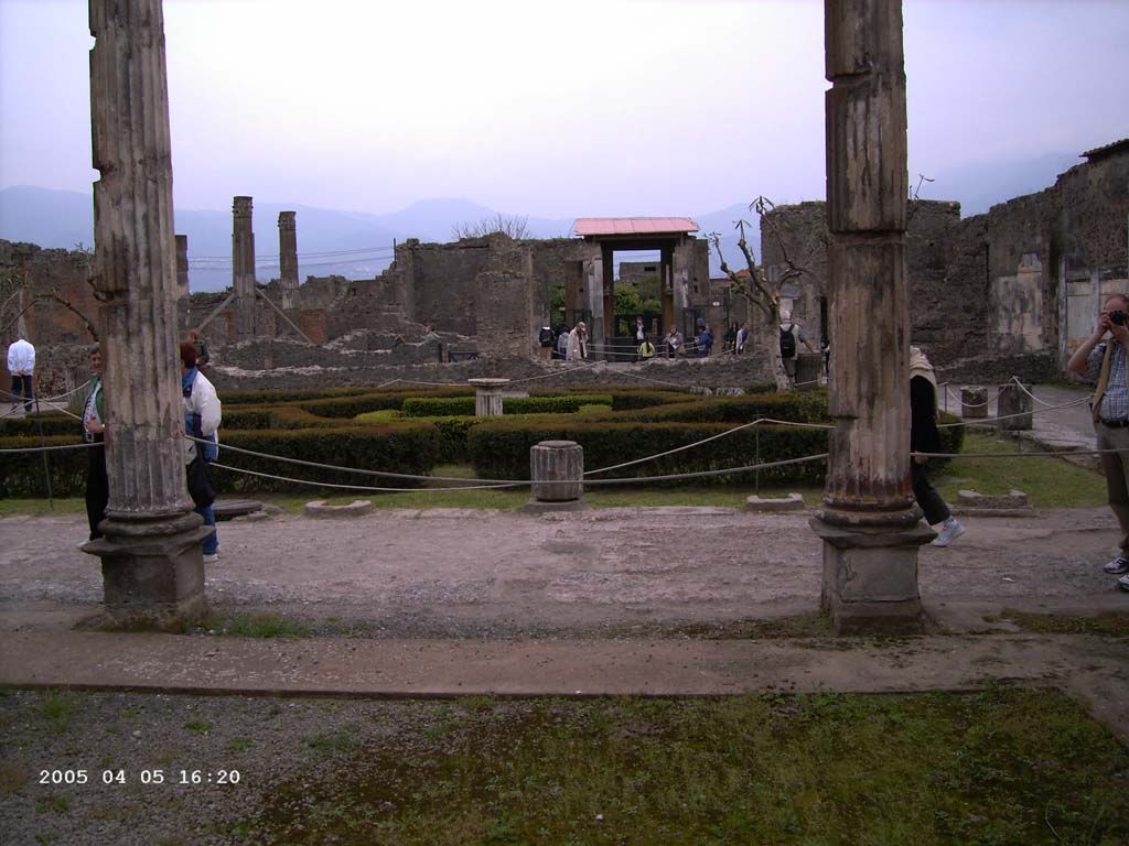 VI.12.2 Pompeii. April 2005. Looking south from exedra with(out) Alexander mosaic onto middle peristyle, and across towards atrium. 
Photo courtesy of Klaus Heese.