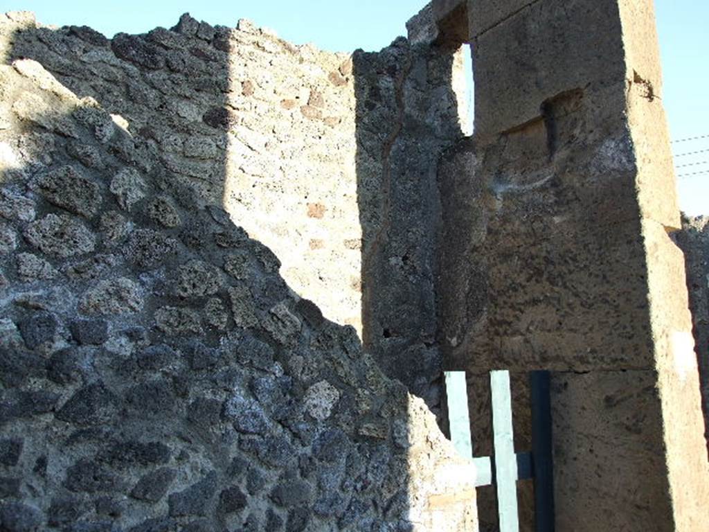 VI.12.4 Pompeii. December 2006. South-east corner of shop.