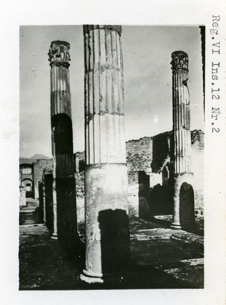 VI.12.5 Pompeii. Pre-1937-39.
Looking north-east across atrium 7 and impluvium with corridor in VI.12.2 on eastern side, on left.
Photo courtesy of American Academy in Rome, Photographic Archive. Warsher collection no. 032.