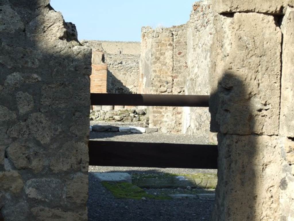 VI.13.1 Pompeii. December 2007. Doorway in north wall looking into atrium of VI.13.2.