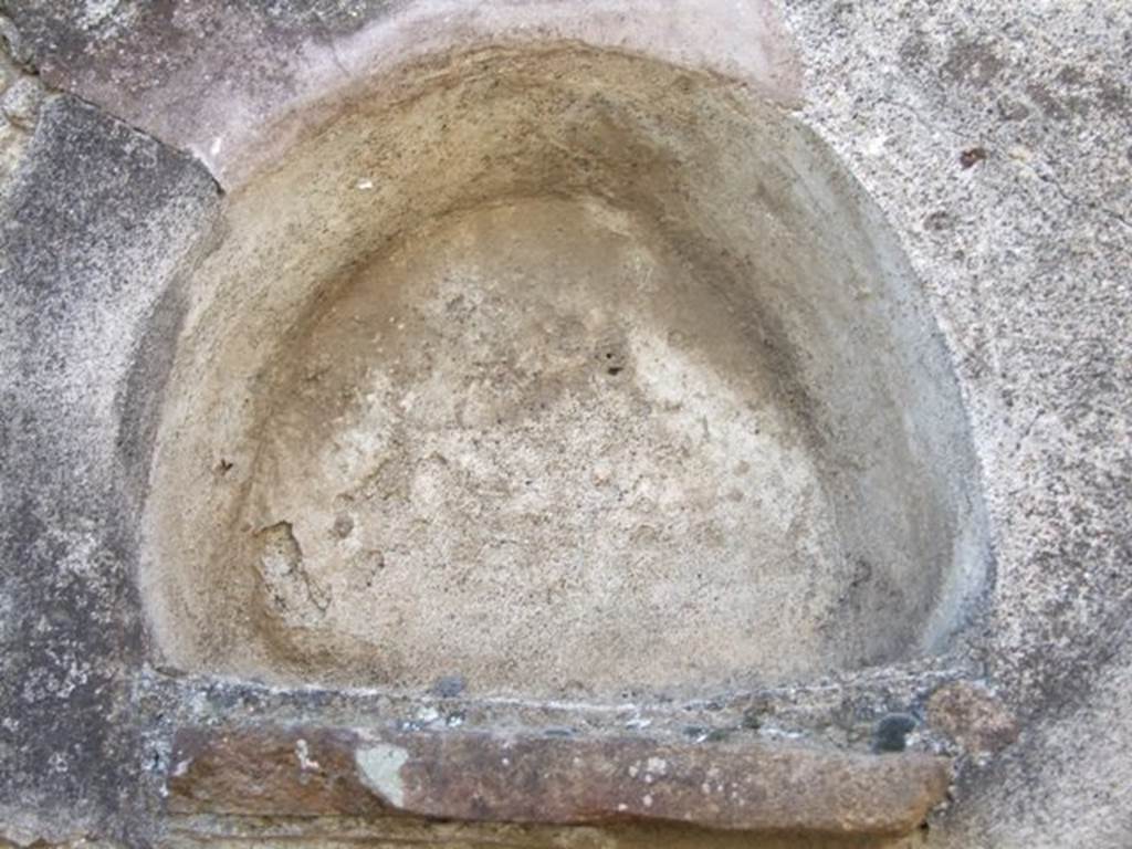 VI.13.7 Pompeii. December 2007. Second niche in west wall, at south end.
According to Boyce, in the west wall is an arched niche with projecting floor.
See Boyce G. K., 1937. Corpus of the Lararia of Pompeii. Rome: MAAR 14. (p.52, no.194) .