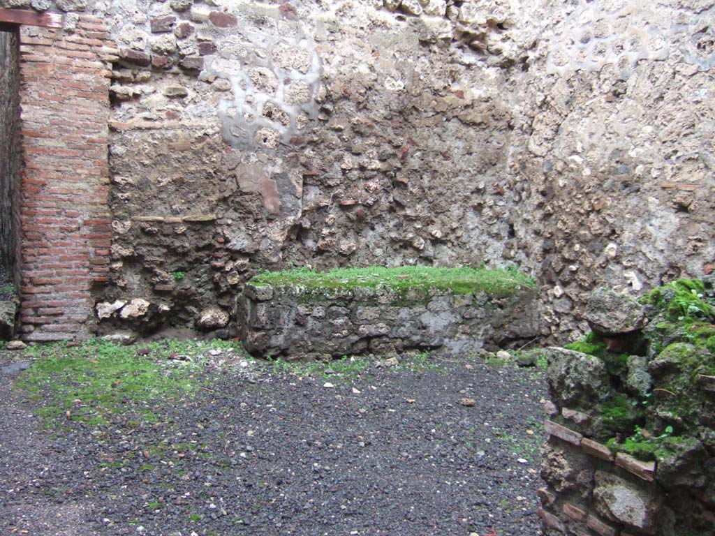VI.13.12 Pompeii. December 2005. 
Looking north-west across room formerly linked to kitchen area by means of the blocked doorway.