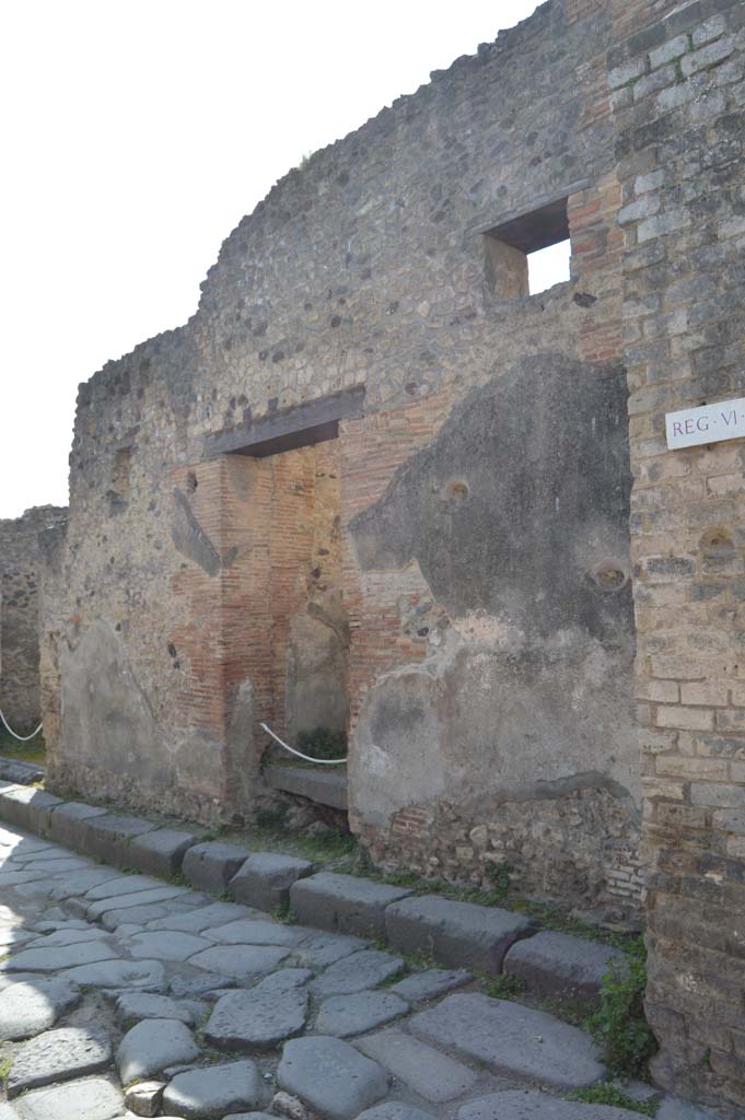 VI.13.16, Pompeii. March 2019. 
Looking south-west to entrance doorway in Vicolo dei Vettii, with water tower, on right. 
Foto Taylor Lauritsen, ERC Grant 681269 DÉCOR.