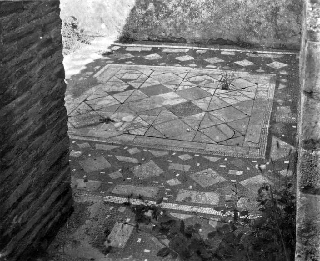 VI.13.16 Pompeii. c.1930. Looking east through doorway of cubiculum on south (left) side of entrance doorway.
The flooring has a marble centre laid into a background of black mosaic enlivened by pieces of white and coloured marbles.
See Blake, M., (1930). The pavements of the Roman Buildings of the Republic and Early Empire. Rome, MAAR, 8, (p.45, 65 & Pl.13, tav.1).