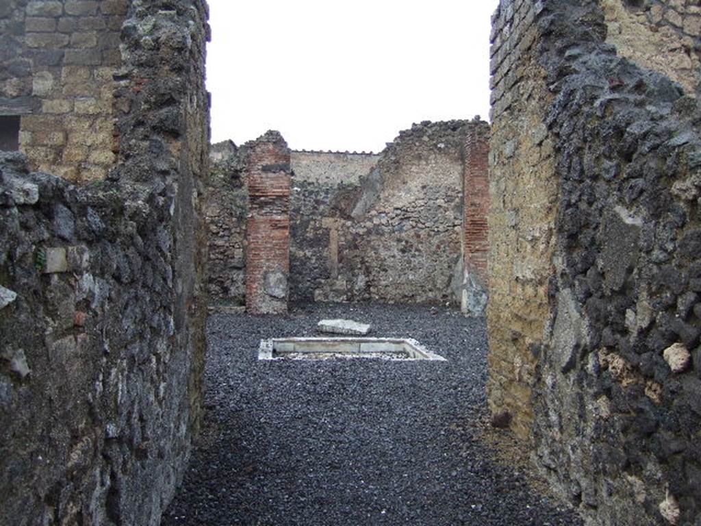 VI.14.5 Pompeii. December 2005. Looking north across atrium towards tablinum, from entrance corridor.