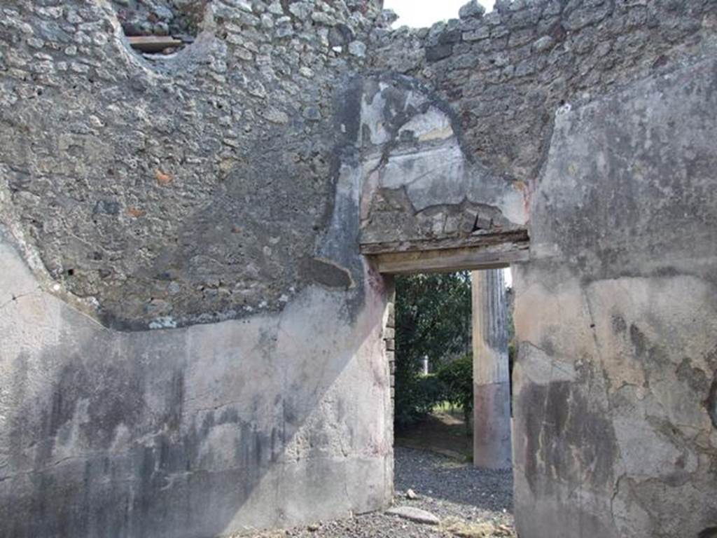 VI.14.20  Pompeii.  March 2009.   Room 17.  South east corner with door to portico area.