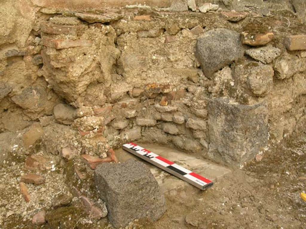 VI.14.22 Pompeii. June 2006. Room 9, looking north along west side of kitchen.
Photo courtesy of Nicolas Monteix.