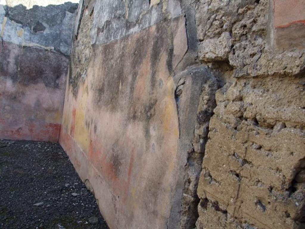 VI.14.22 Pompeii. December 2007. Room 15, south wall of triclinium. According to BdI, on this wall (the right wall) the following paintings were seen upon excavation:
In the middle of the right wall:(1.12 high  x 1.12 wide) but very faded: Judgement of Paris.
On the same wall to the right: medallion (0.33 diam), preserved better than the others showing a crowned Bacchante, with blond hair.
To the right of the medallion: Flying cupid, carrying an object in his hand but this was not clear.
On the upper part of the wall was the usual fantastique architectural decoration with the following figures – Right wall, from the east end: Flying female figure, Neptune bearded and naked, Victoria with palm. See BdI, 1876, (p.24-28)