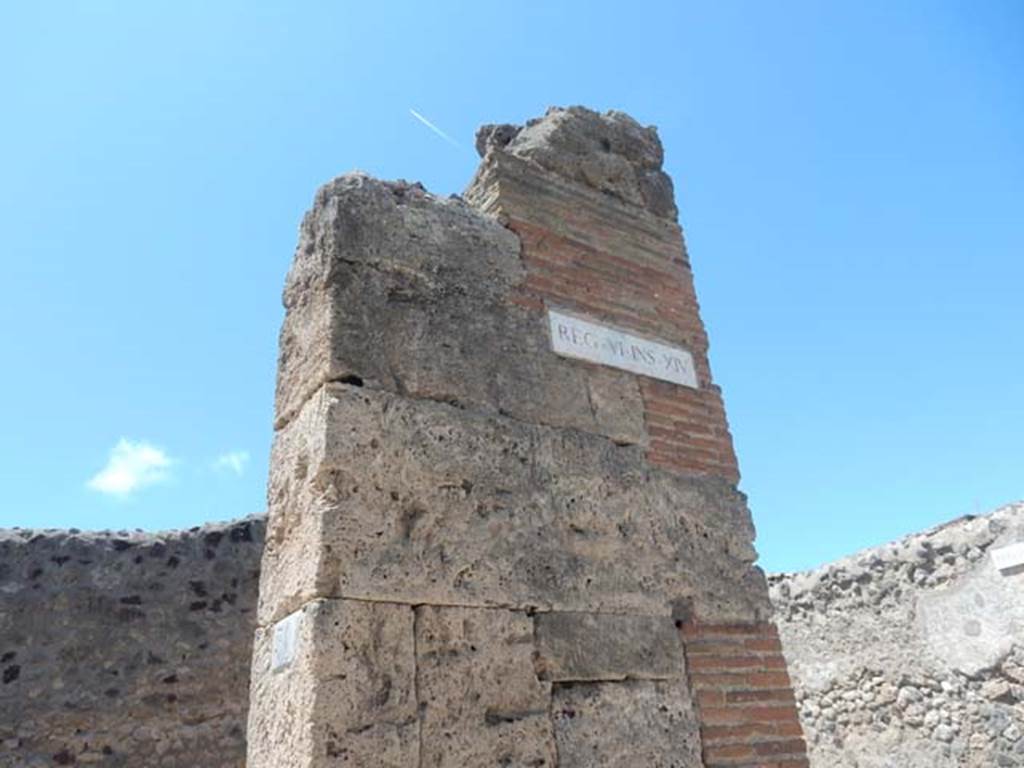 VI.14.31 Pompeii. May 2017. Looking towards pilaster on north side of entrance doorway. This is the north-east corner of the insula.  Photo courtesy of Buzz Ferebee.