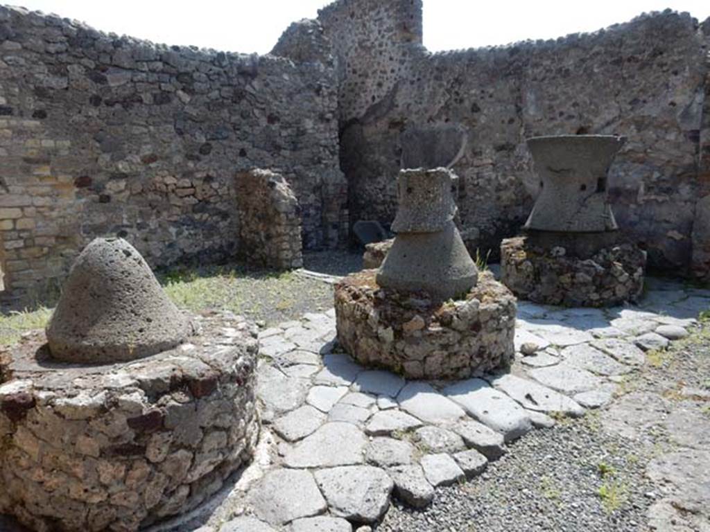 VI.14.32 Pompeii. May 2015. Mills on east side. Photo courtesy of Buzz Ferebee.