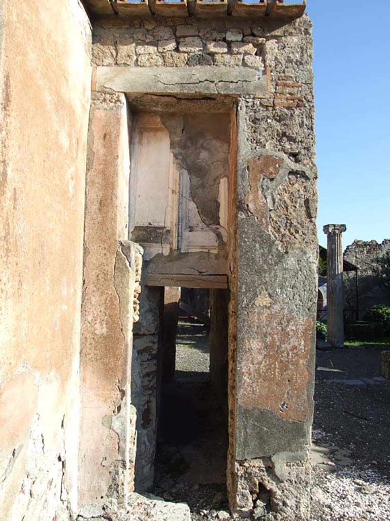 VI.14.43 Pompeii. December 2007.  
Room 6, west end of corridor in atrium, leading east to rear of house with preserved outline of doors above.