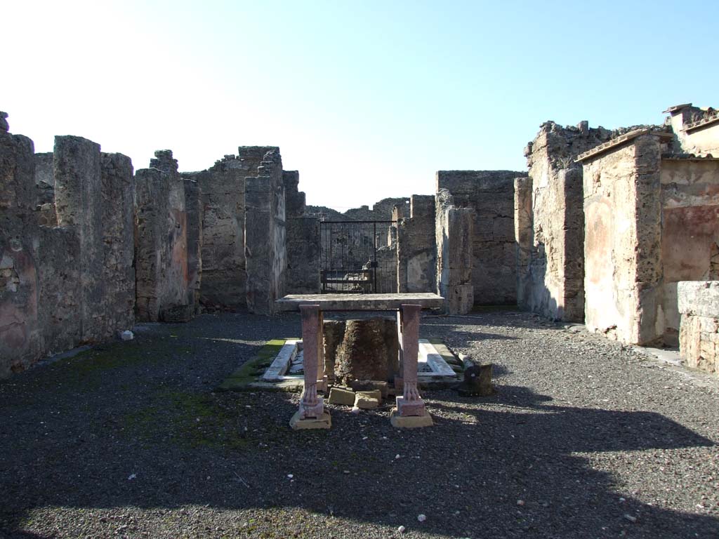 VI.14.43 Pompeii. December 2007. Room 1, looking west across atrium, towards front entrance.
According to Breton, found on the left of the atrium on a pilaster that separated two cubicula, was CIL IV 1520. 
This would be on the right of this photo.