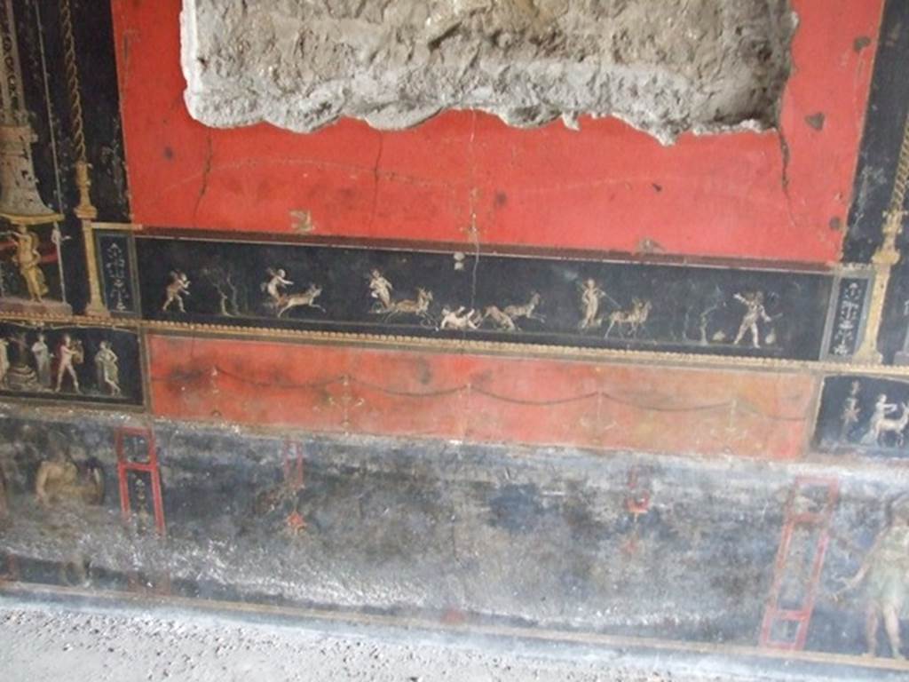 VI.15.1 Pompeii. December 2006. Room of the Cupids or Cherubs. East wall. Painting of Cupids in a Race between Chariots pulled by Deer. Underneath left and right are standing figures of Amazons.