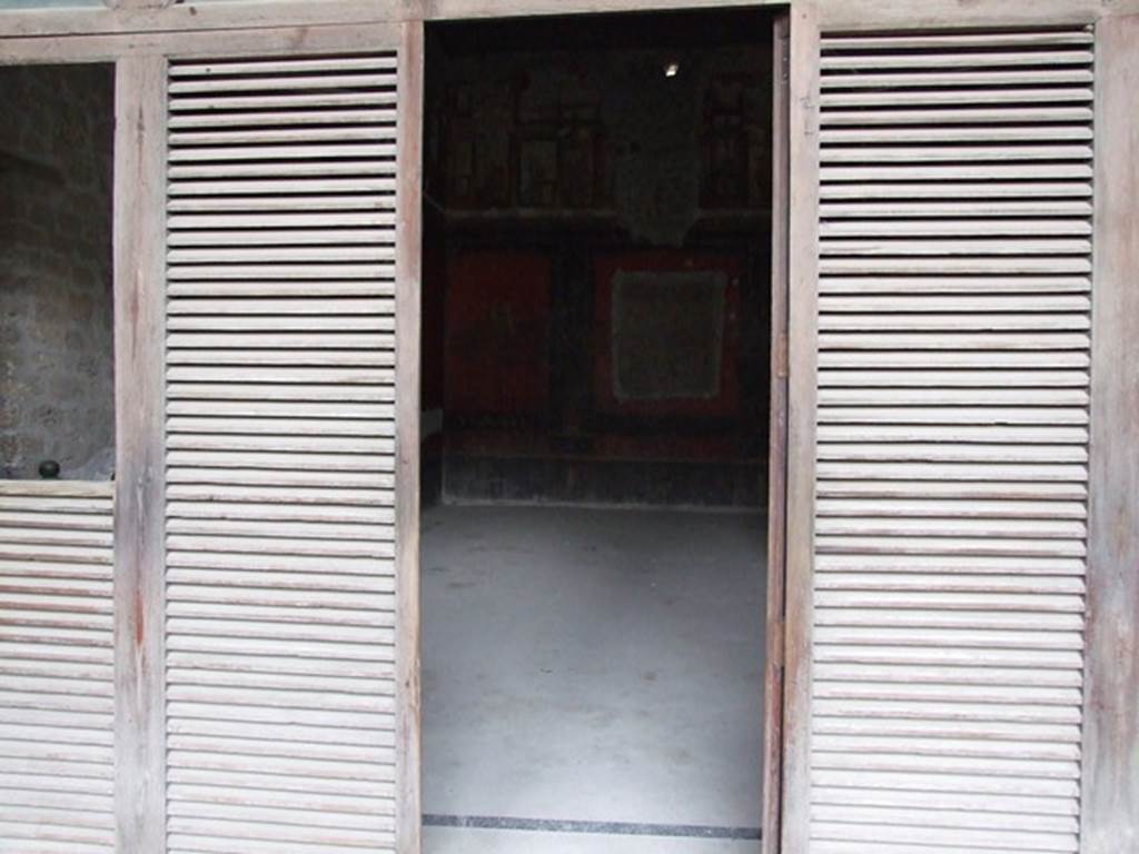 VI.15.1 Pompeii. December 2006. Doorway to room on north portico, of the cupids or cherubs.