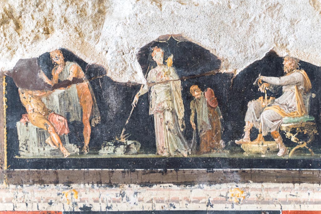 VI.15.1 Pompeii. March 2023. Detail of painted panel from west wall at south side of central panel. Photo courtesy of Johannes Eber.