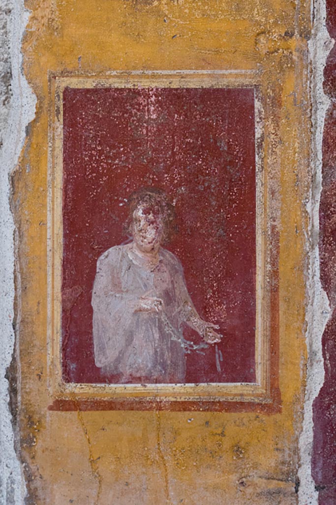 VI.15.1 Pompeii. March 2023.
Detail from painted panel on west wall between atrium and north ala. Photo courtesy of Johannes Eber.
