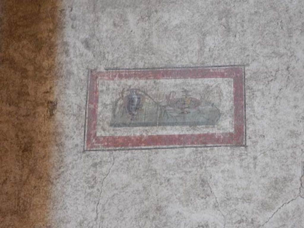 VI.15.1 Pompeii. May 2017. Painted panel from south end of west wall. Photo courtesy of Buzz Ferebee.