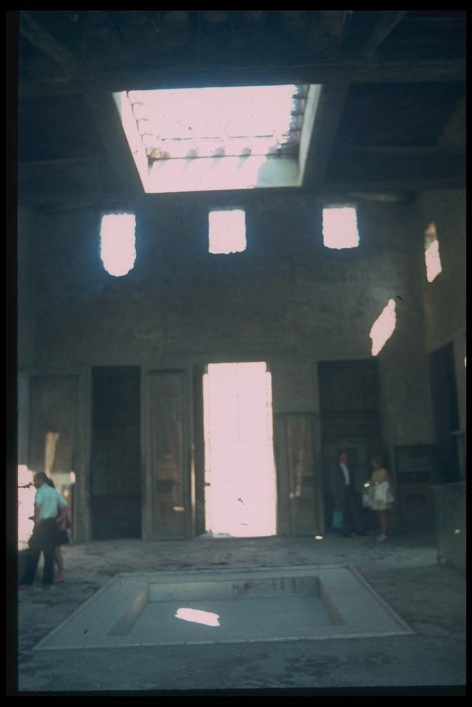 VI.15.1 Pompeii. Looking east towards entrance across atrium.
Photographed 1970-79 by Günther Einhorn, picture courtesy of his son Ralf Einhorn.