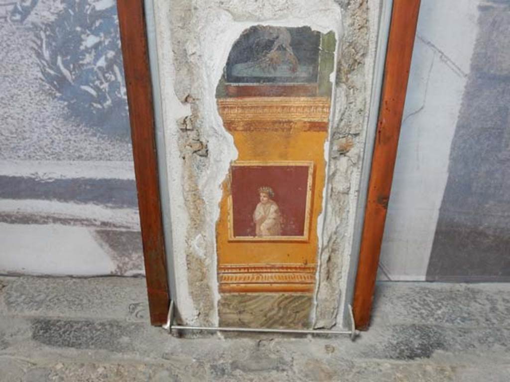 VI.15.1 Pompeii. May 2017. Painted panel on north end of west wall of atrium, leading onto peristyle. Photo courtesy of Buzz Ferebee.