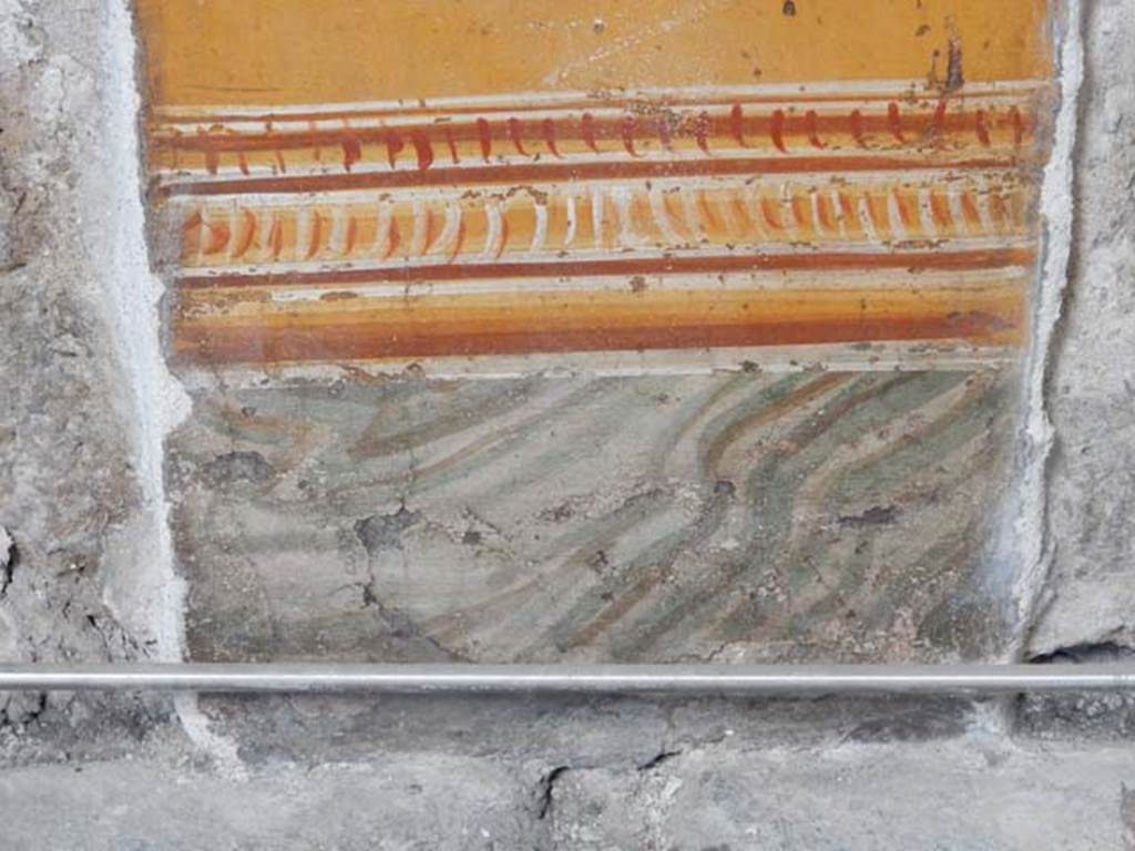 VI.15.1 Pompeii. May 2017.
Detail from painted panel on north end of lower west wall of atrium, leading onto peristyle. Photo courtesy of Buzz Ferebee.