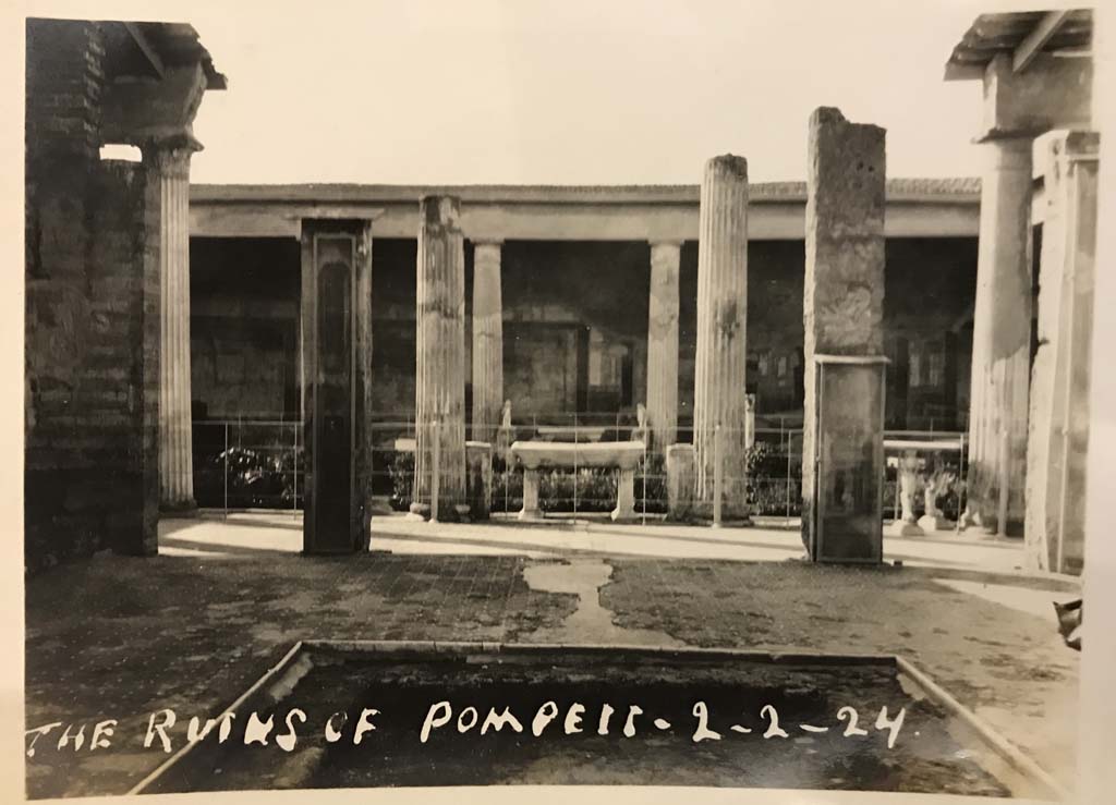 VI.15.1 Pompeii. 2nd February 1924. Looking west from impluvium in an unroofed atrium towards peristyle.
Photo courtesy of Rick Bauer.