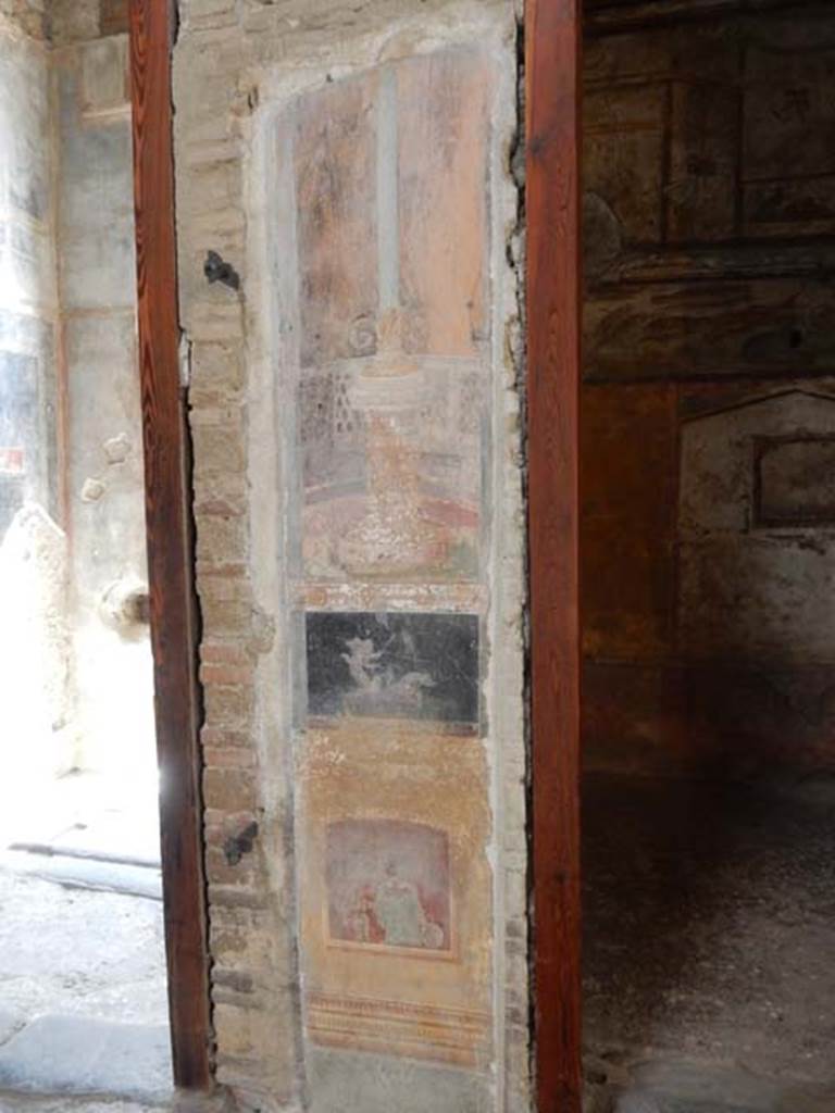 VI.15.1 Pompeii. May 2017. Detail of painting in atrium and doorway to bedroom on left of main entrance. Photo courtesy of Buzz Ferebee.