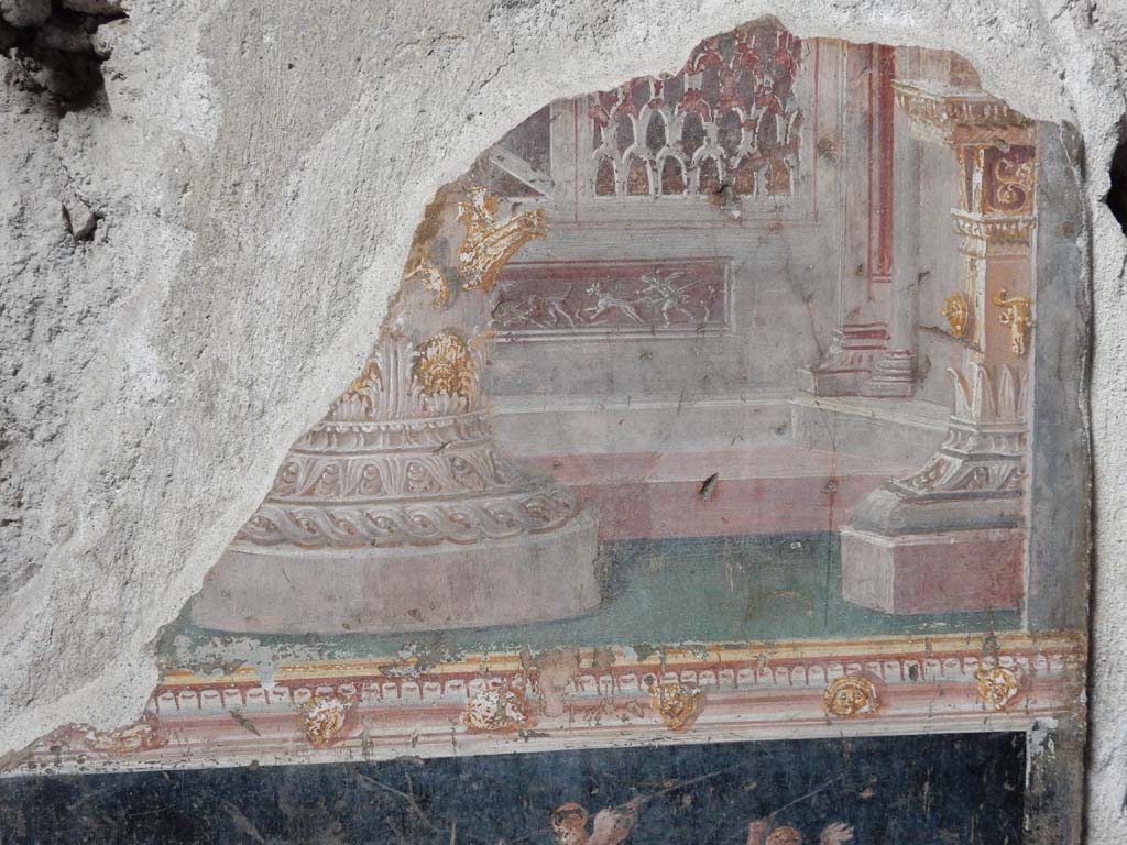 VI.15.1 Pompeii. June 2019.
Detail of painting in atrium between doorways to bedroom on left of main entrance and oecus on south side.
Photo courtesy of Buzz Ferebee.
