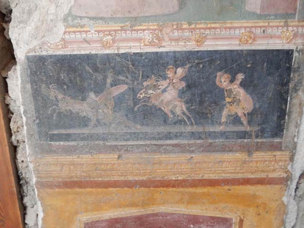 VI.15.1 Pompeii. May 2017. Detail of painting in atrium between doorways to bedroom on left of main entrance and oecus on south side, after restoration.
Photo courtesy of Buzz Ferebee.
