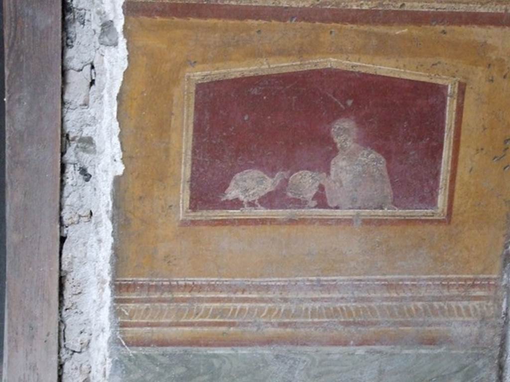 VI.15.1 Pompeii. December 2006. Detail of painting in Atrium on doorway to bedroom on left of main entrance.