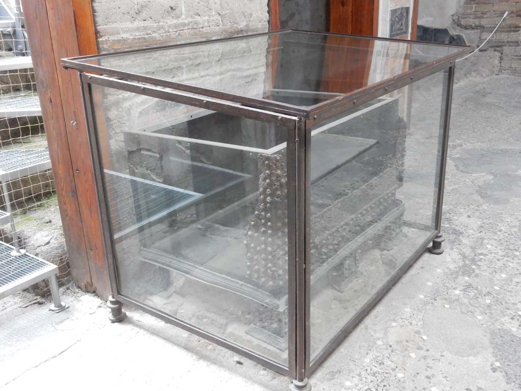 VI.15.1 Pompeii. June 2019. Looking towards south side of atrium and restored strong-box. Photo courtesy of Buzz Ferebee.