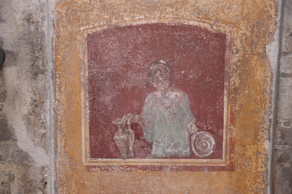 VI.15.1 Pompeii. October 2023.
East wall of atrium, detail from panel between entrance corridor and cubiculum on south side of entrance. Photo courtesy of Klaus Heese.