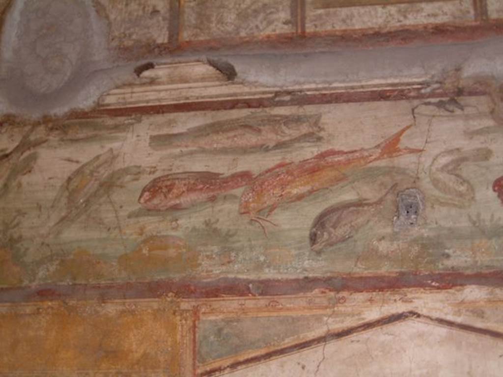 VI.15.1 Pompeii. Detail of frieze showing fish and marine life, May 2001.
Courtesy of Current Archaeology.