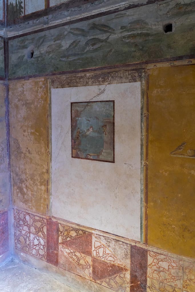 VI.15.1 Pompeii. March 2023.
Looking east along south wall with central painting of Leander and Hero.
Photo courtesy of Johannes Eber.