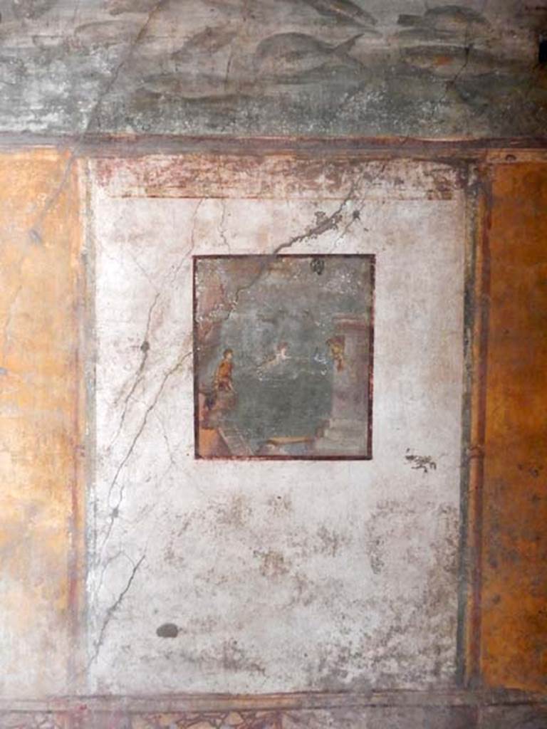 VI.15.1 Pompeii. May 2017. Central panel on south wall of bedroom on left of main entrance, with painting of Leander swimming towards his beloved Hero in her tower.
Photo courtesy of Buzz Ferebee.